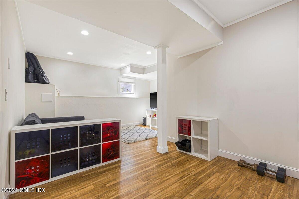70 Gregory Road Cos Cob, CT 06807 - Photo 25 of 39 a view of a livingroom with furniture and an empty room