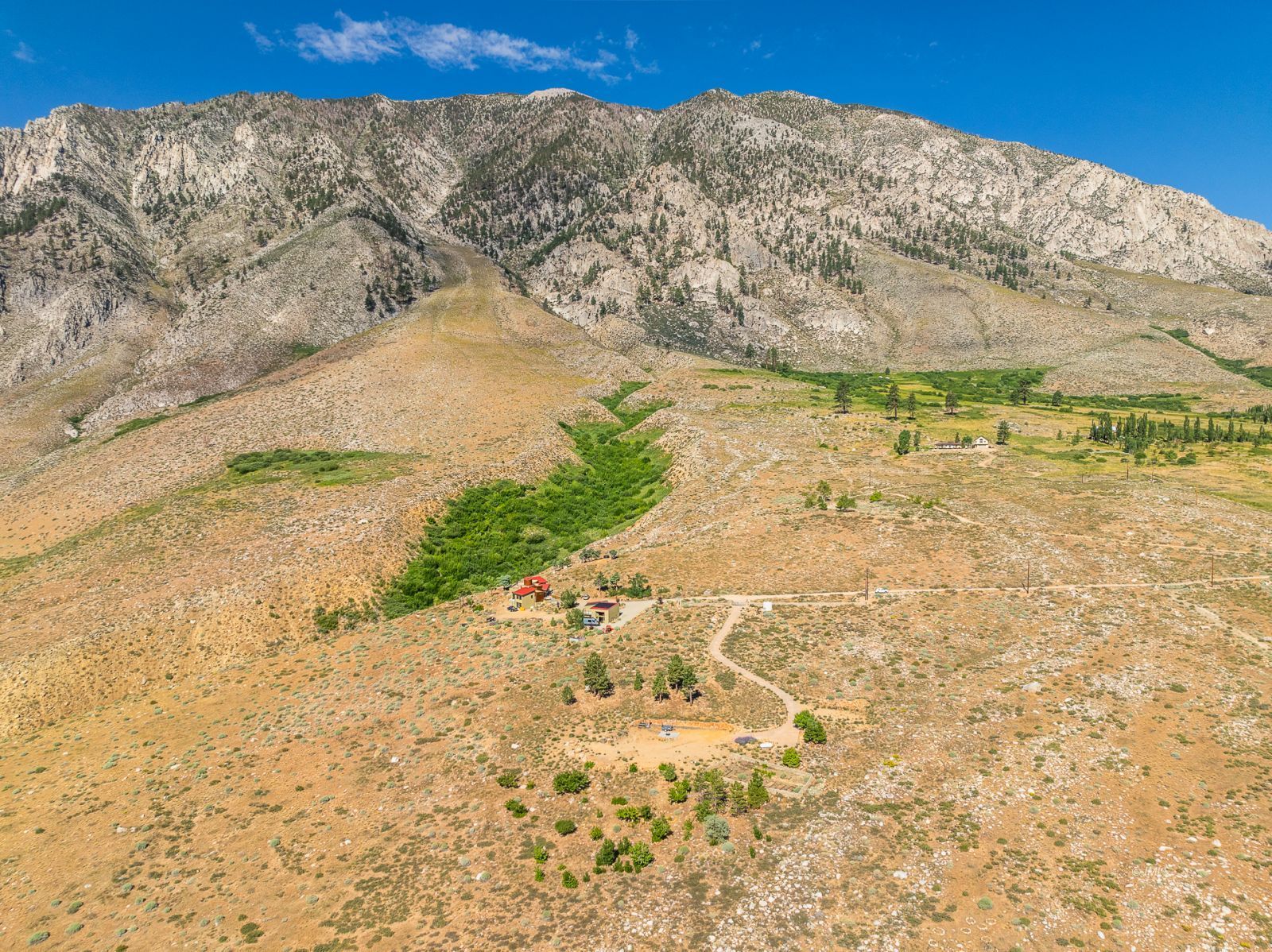 507 Willow Road Bishop, CA 93514 - Photo 26 of 35 a view of a yard with an ocean view