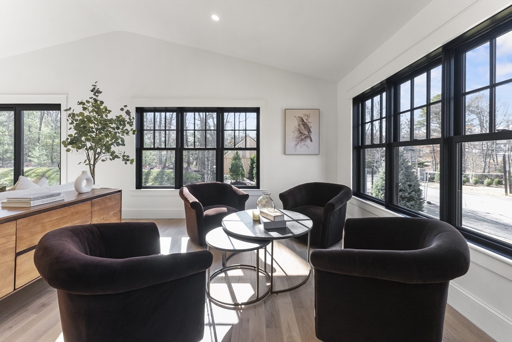46 Sandwich Road, Unit 41 Plymouth, MA 02360 - Photo 19 of 42 a living room with furniture and a large window