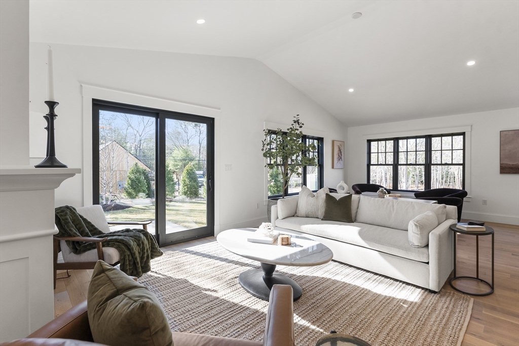 46 Sandwich Road, Unit 41 Plymouth, MA 02360 - Photo 21 of 42 a living room with furniture and a large window