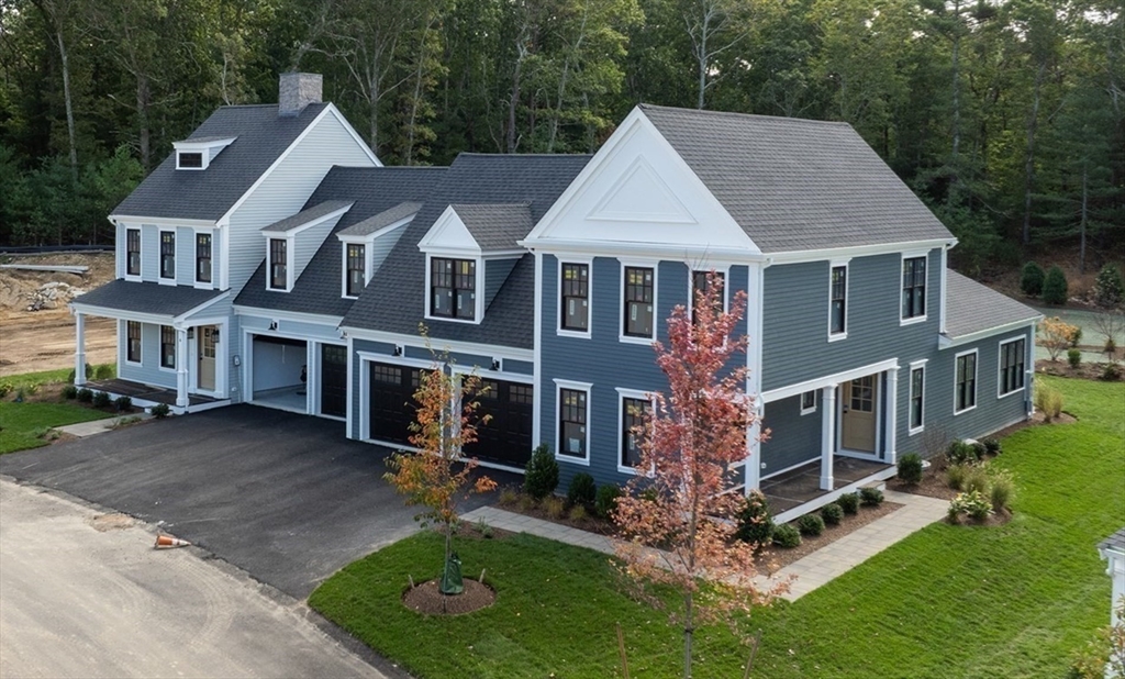 46 Sandwich Road, Unit 41 Plymouth, MA 02360 - Photo 7 of 42 front view of a house with a yard