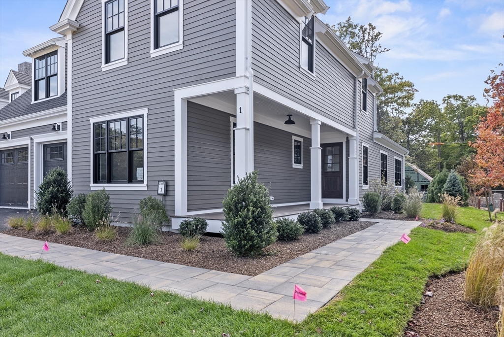 46 Sandwich Road, Unit 41 Plymouth, MA 02360 - Photo 10 of 42 a front view of a house with garden