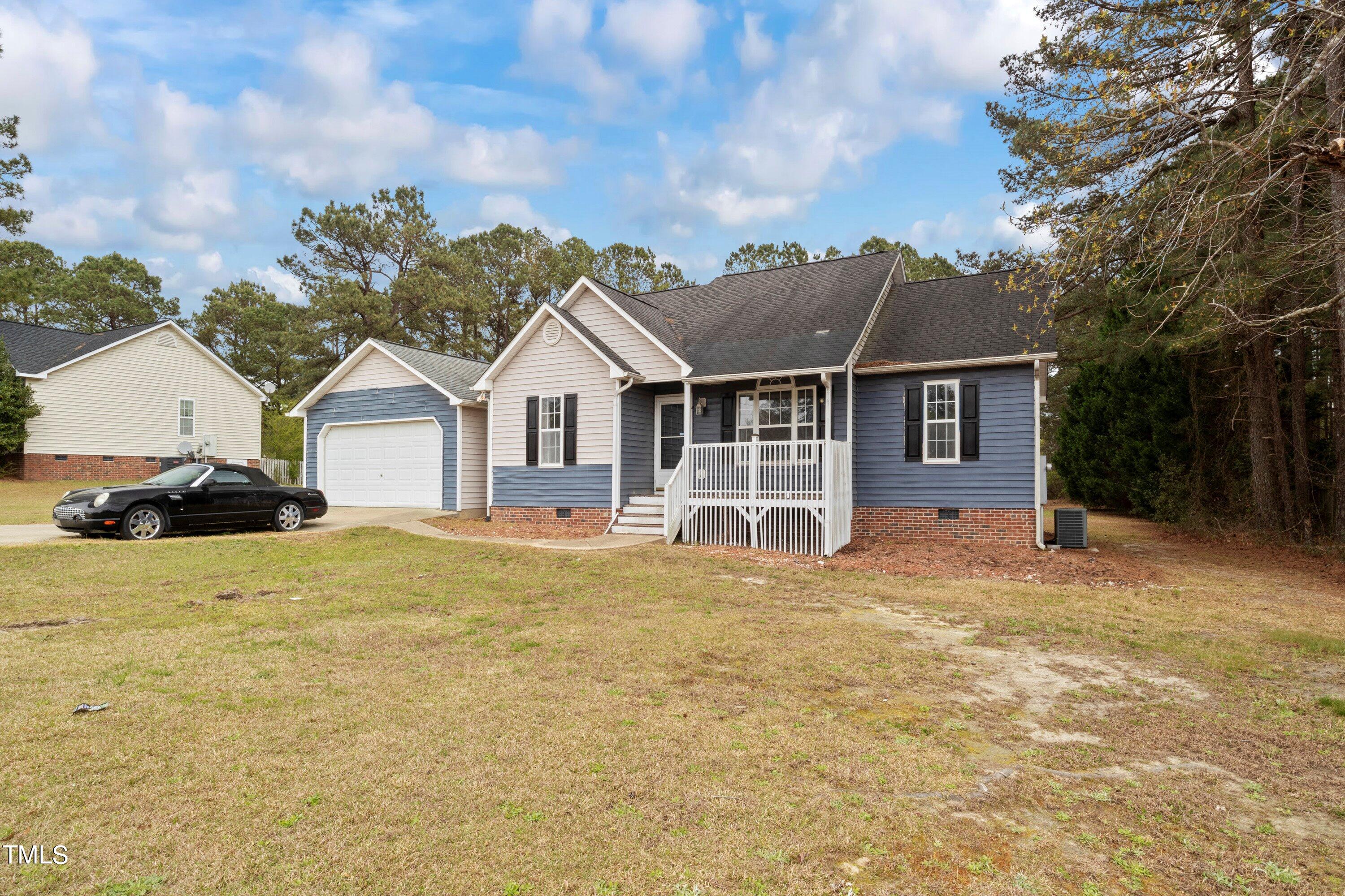 271 Old Fairground Road Willow Spring, NC 27592 - Photo 2 of 11 04-271 Old Fairground Rd20230326_0023