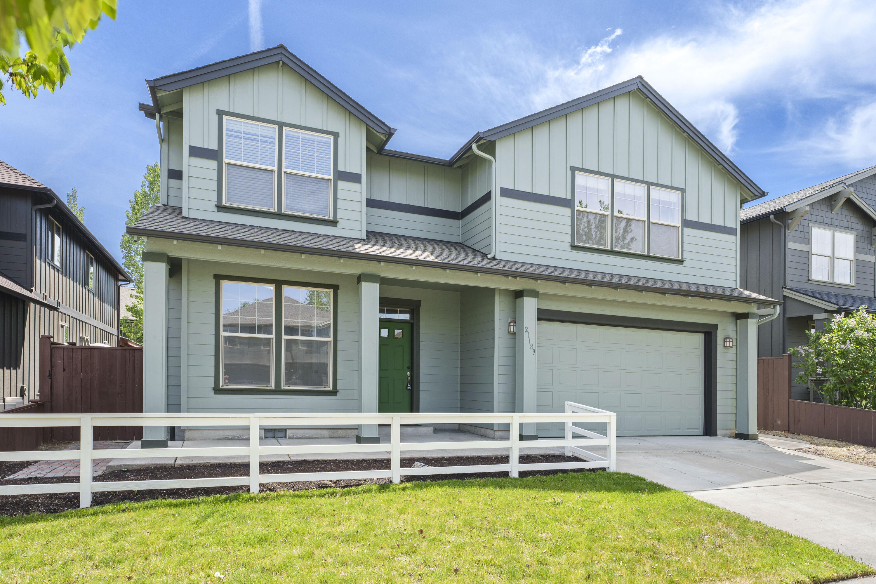 21189 Ritz Place Bend, OR 97702 - Photo 1 of 37 a view of a house with a yard