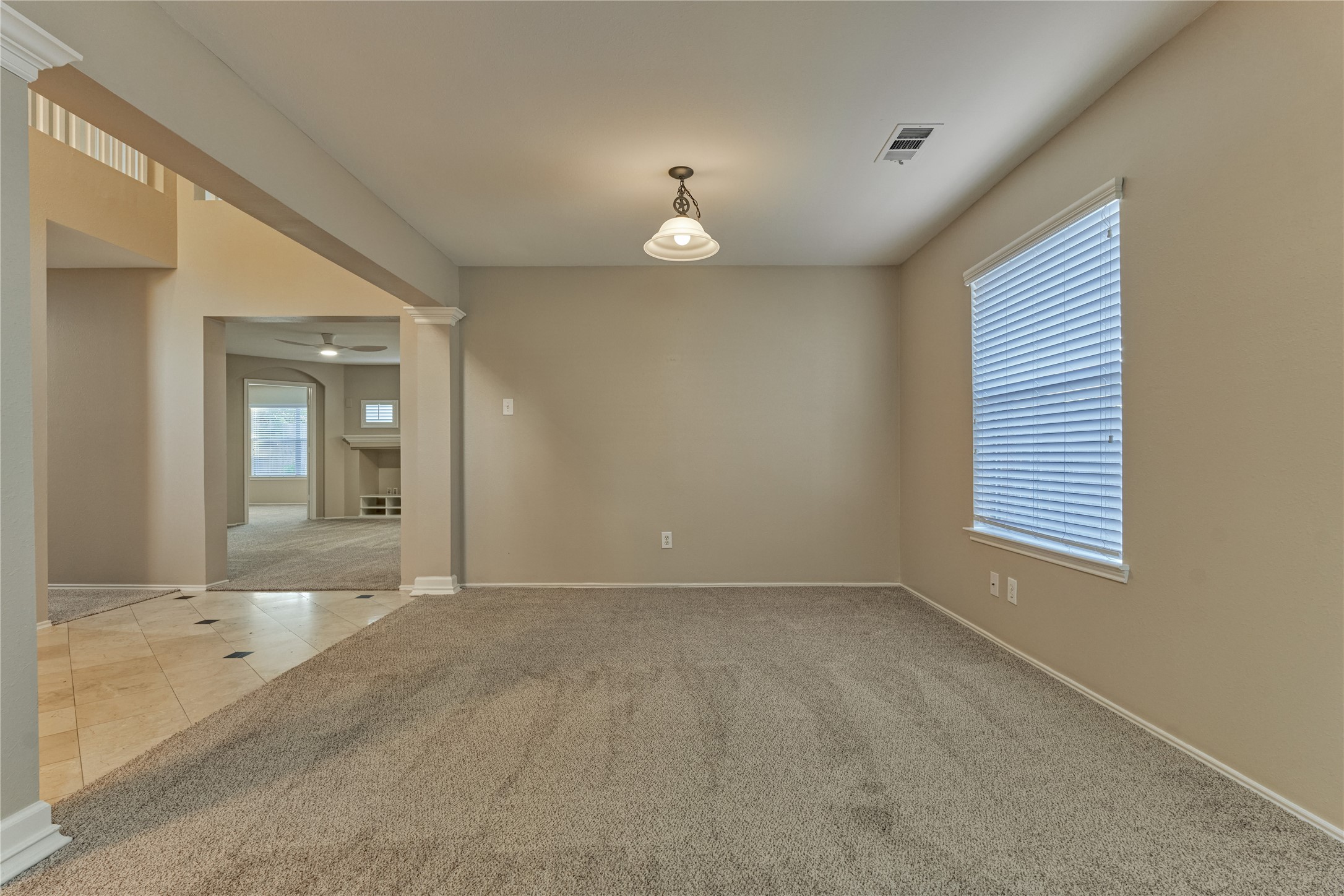 11714 Curry Ridge Lane Tomball, TX 77377 - Photo 12 of 50 This portion of the living room could be a formal dining area.