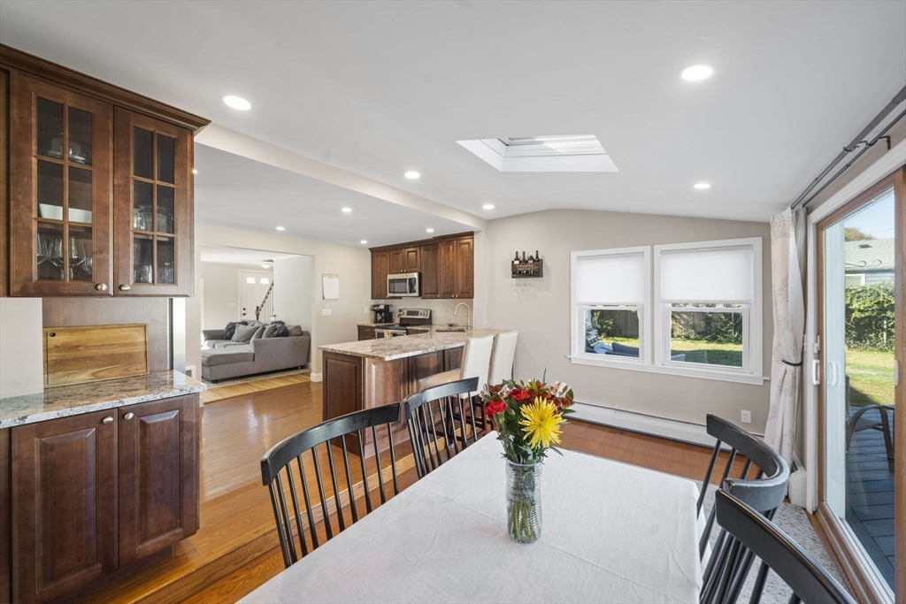 7 Rainbow Terrace Danvers, MA 01923 - Photo 13 of 33 a dining room with furniture water view and large windows