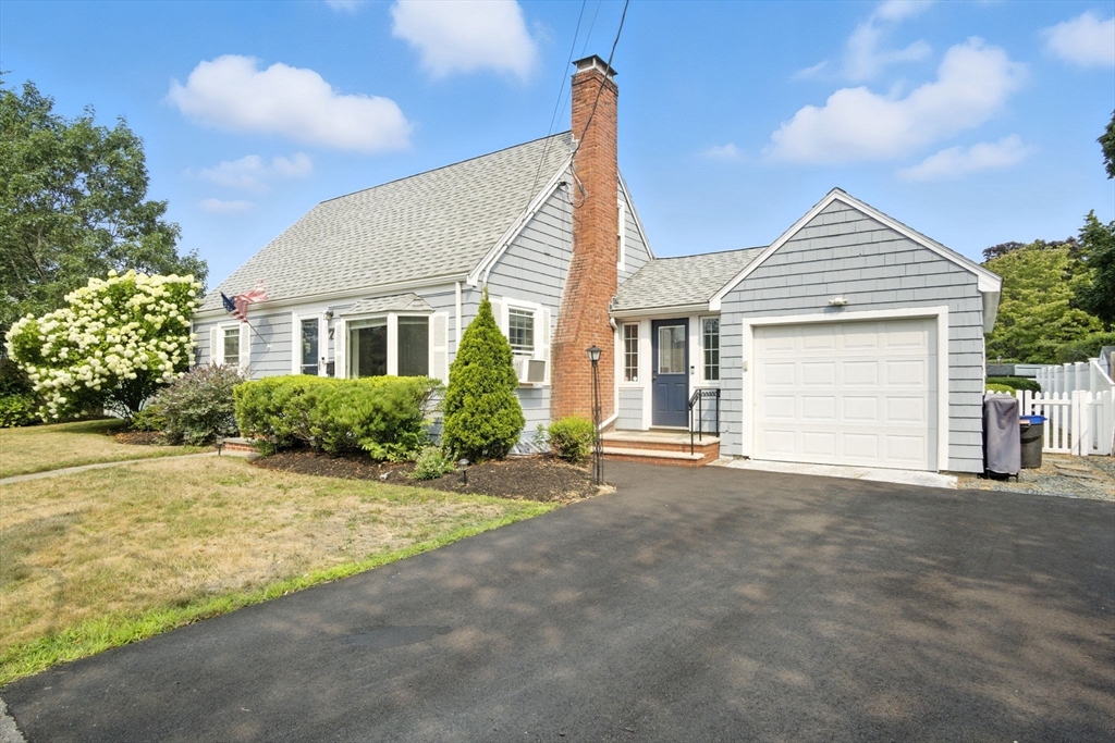 7 Rainbow Terrace Danvers, MA 01923 - Photo 2 of 33 a view of a house with a yard and potted plants