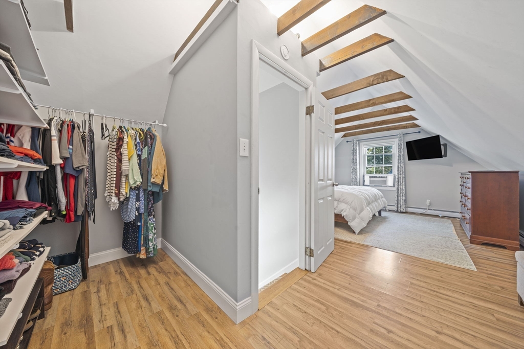 7 Rainbow Terrace Danvers, MA 01923 - Photo 23 of 33 a view of walk in closet with clothes and shoes