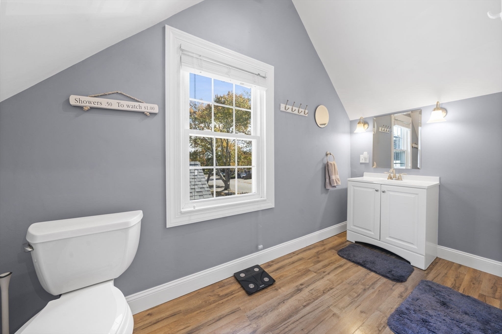 7 Rainbow Terrace Danvers, MA 01923 - Photo 24 of 33 a bathroom with a toilet sink and mirror