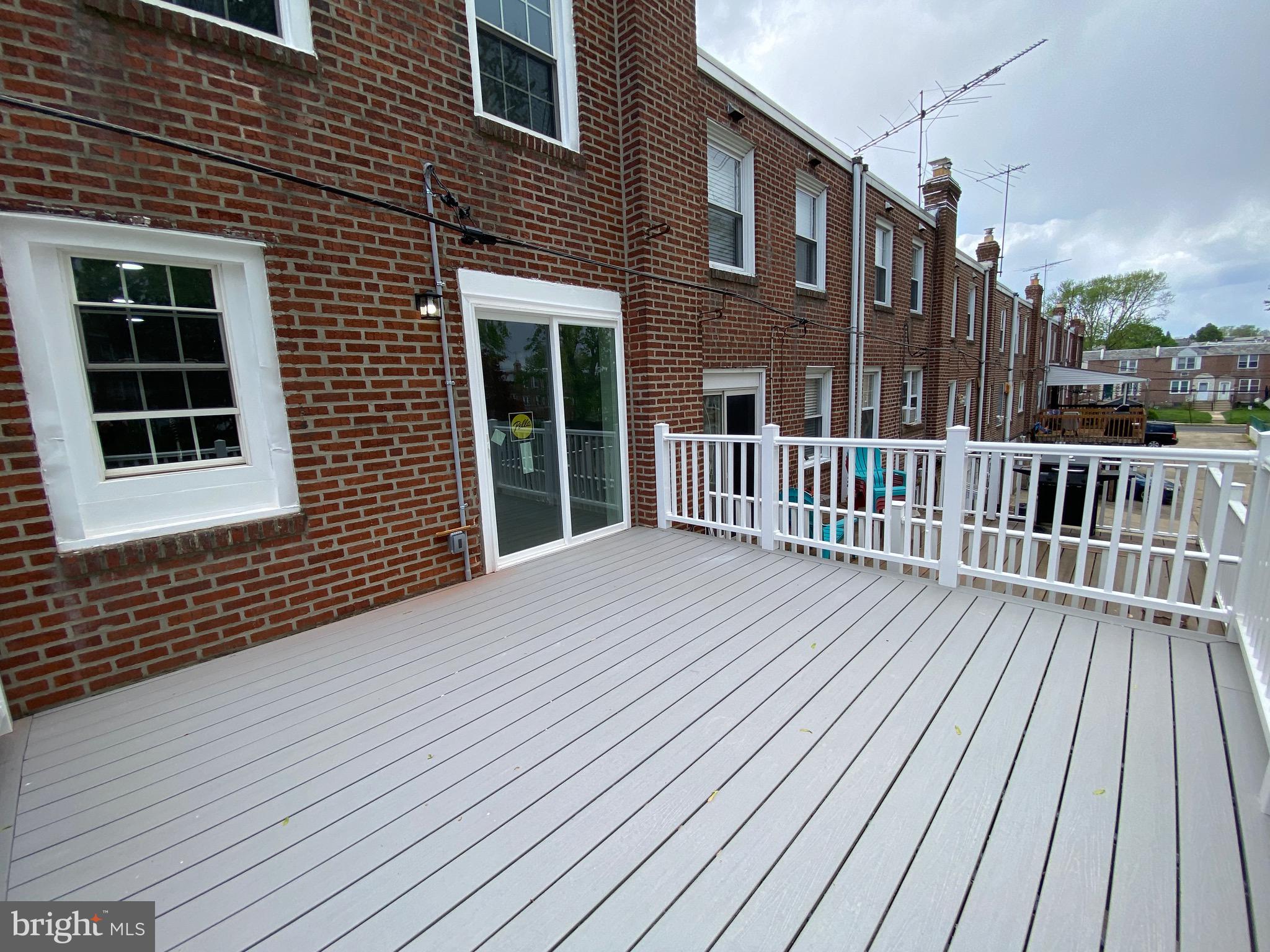 821 Hampshire Road Drexel Hill, PA 19026 - Photo 14 of 36 Deck & Sliders to Kitchen