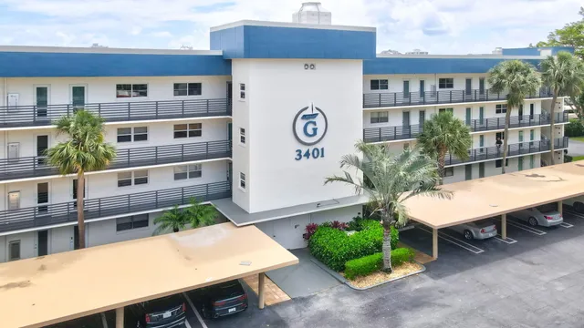 a view of a chairs and table in a patio