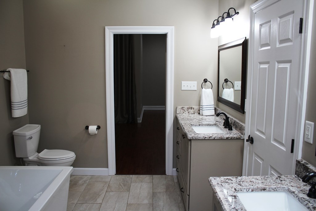 1092 Carpenter Lane Summit, MS 39666 - Photo 18 of 63 Master Bath to Master Bedroom