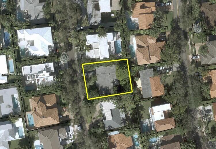 737 Woodcrest Road Key Biscayne, FL 33149 - Photo 3 of 6 an aerial view of houses with yard