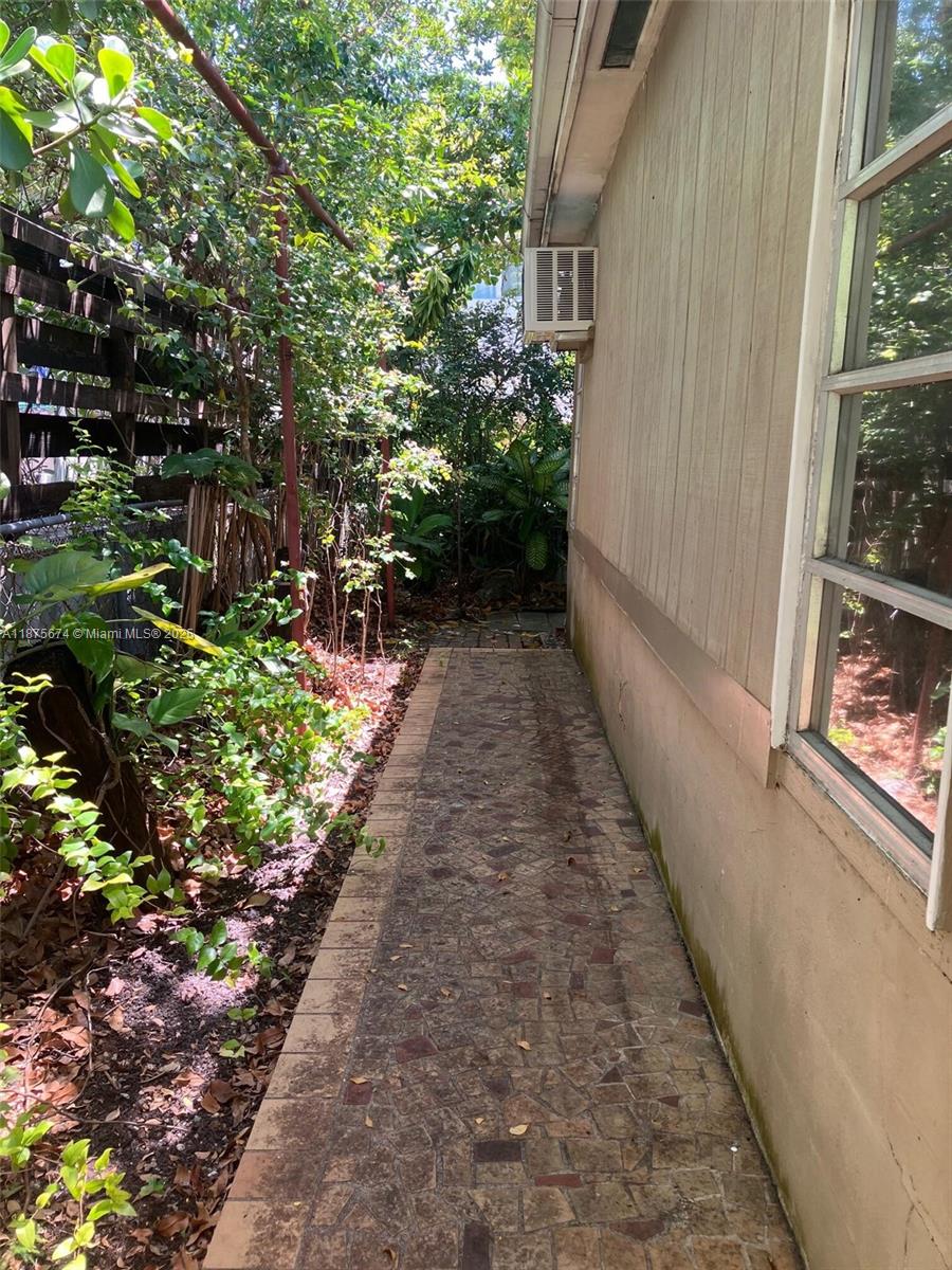 737 Woodcrest Road Key Biscayne, FL 33149 - Photo 5 of 6 a view of a pathway with a pathway