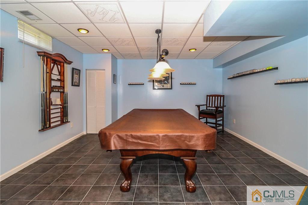 1115 New Dover Road Edison, NJ 08820 - Photo 22 of 25 a room with furniture and window
