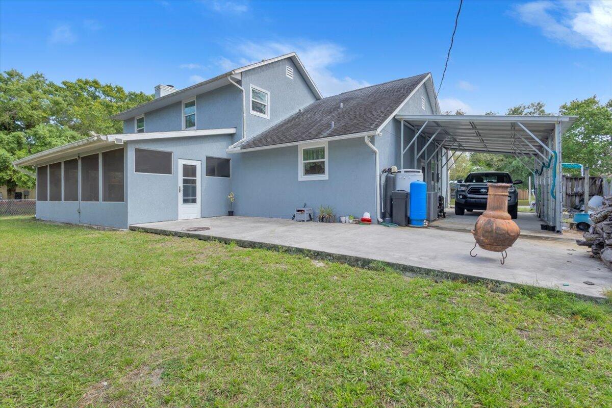 7202 Kenwood Road Fort Pierce, FL 34951 - Photo 21 of 25 Ext back patio view