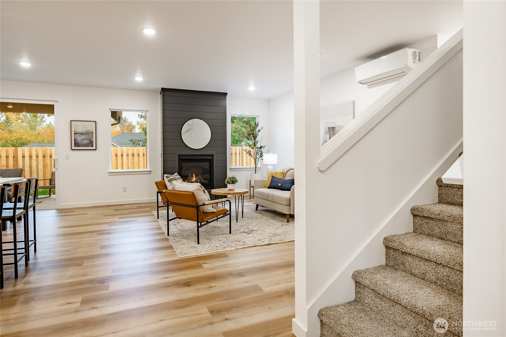 2986 Cedar View Road Blaine, WA 98230 - Photo 12 of 40 a living room with furniture and a large mirror