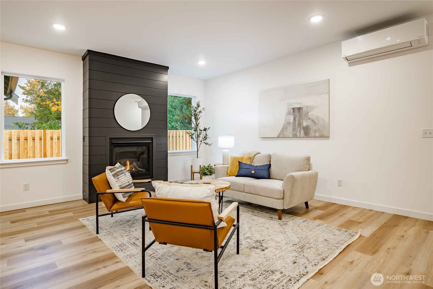 2986 Cedar View Road Blaine, WA 98230 - Photo 13 of 40 a living room with furniture a fireplace and window