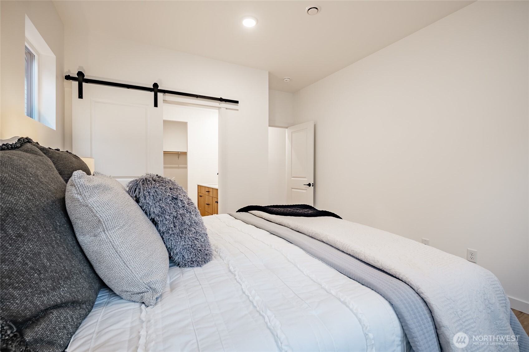 2986 Cedar View Road Blaine, WA 98230 - Photo 28 of 40 a bedroom with a bed and a shower