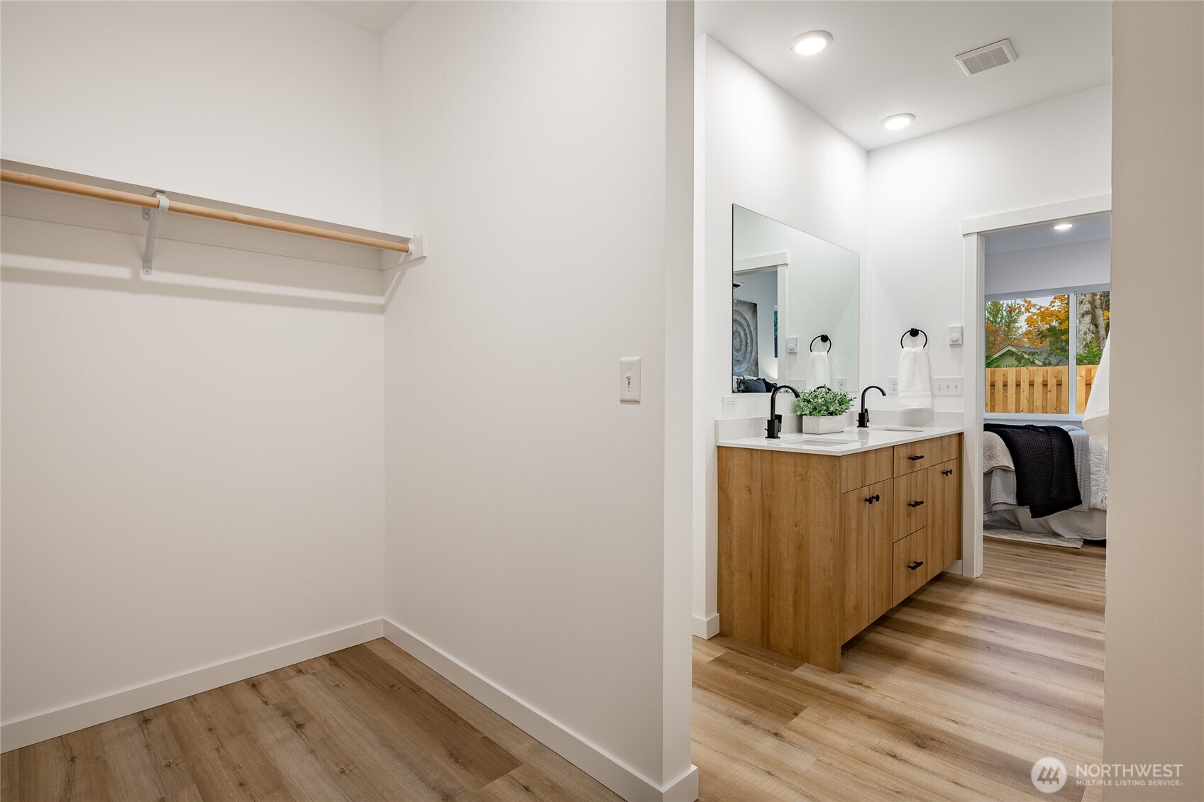 2986 Cedar View Road Blaine, WA 98230 - Photo 31 of 40 a spacious bathroom with a double vanity sink and a mirror