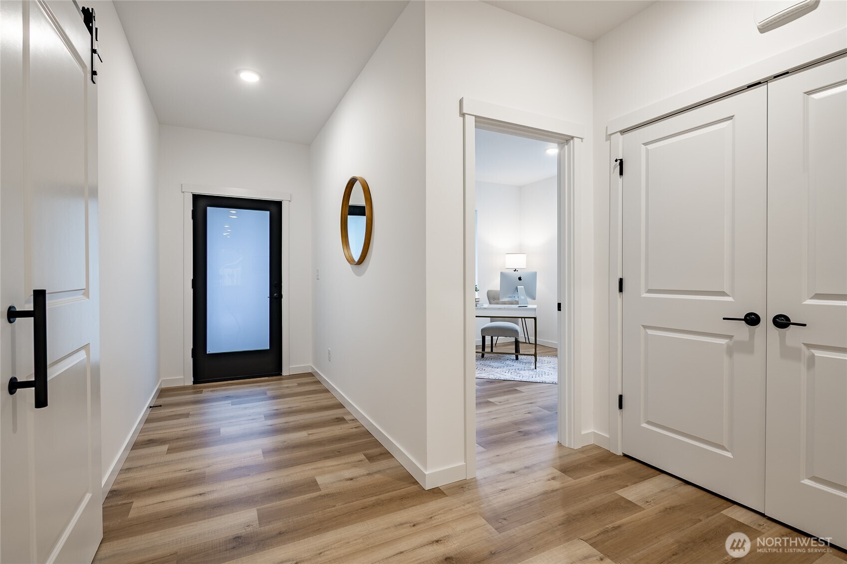 2986 Cedar View Road Blaine, WA 98230 - Photo 4 of 40 a view of a hallway with wooden floor and closet