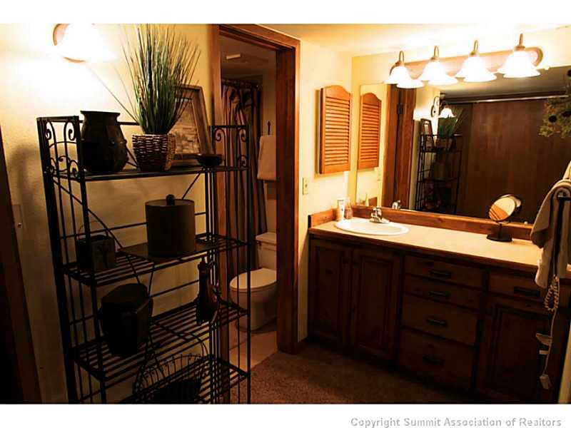 800 Copper Road, Unit 179 Copper Mountain, CO 80443 - Photo 11 of 23 a bathroom with a sink and mirror