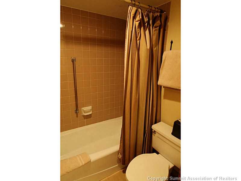 800 Copper Road, Unit 179 Copper Mountain, CO 80443 - Photo 15 of 23 a bathroom with a shower and a toilet