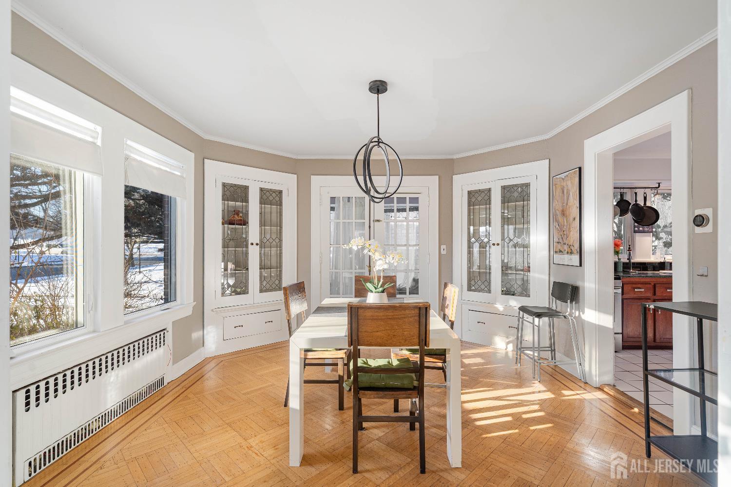 631 Union Avenue Elizabeth, NJ 07208 - Photo 15 of 30 a living room with furniture a chandelier and a large window