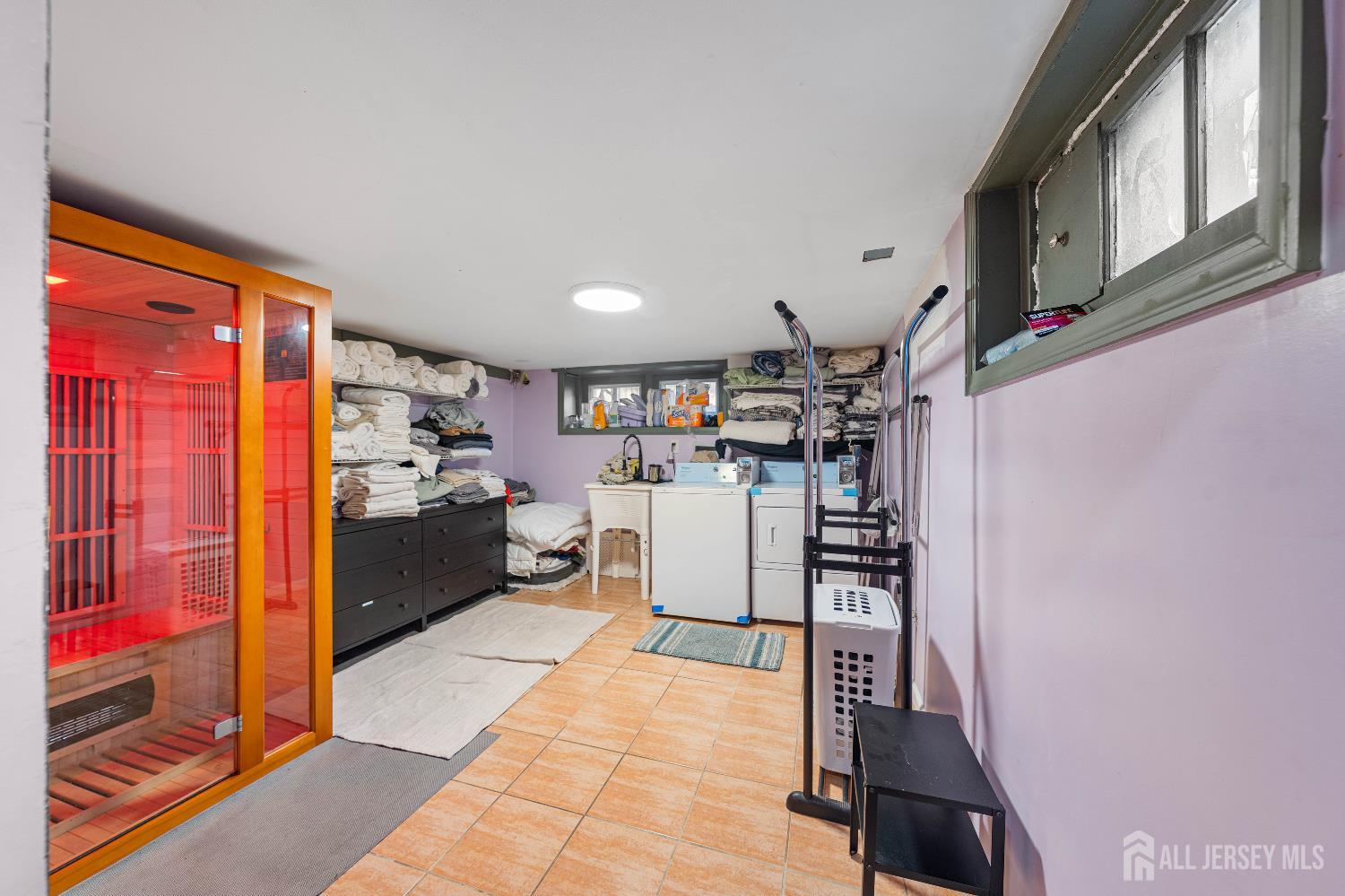 631 Union Avenue Elizabeth, NJ 07208 - Photo 23 of 30 a kitchen with stainless steel appliances kitchen island granite countertop a refrigerator and a stove top oven