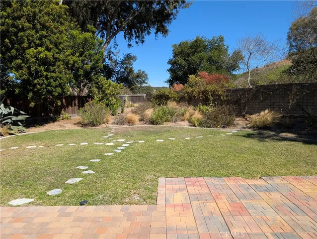 a view of backyard with green space