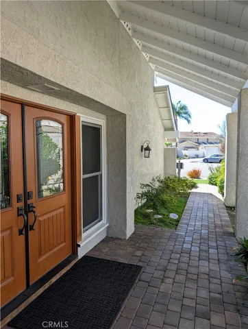 a view of a porch with wooden floor