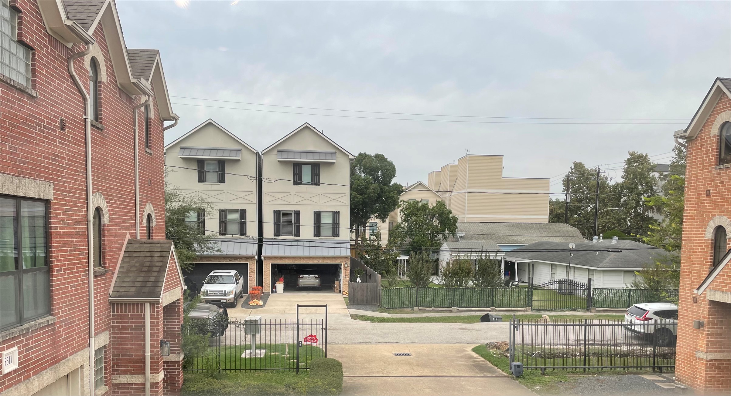 5509 Cornish Street Houston, TX 77007 - Photo 15 of 15 a front view of a residential apartment building with a yard