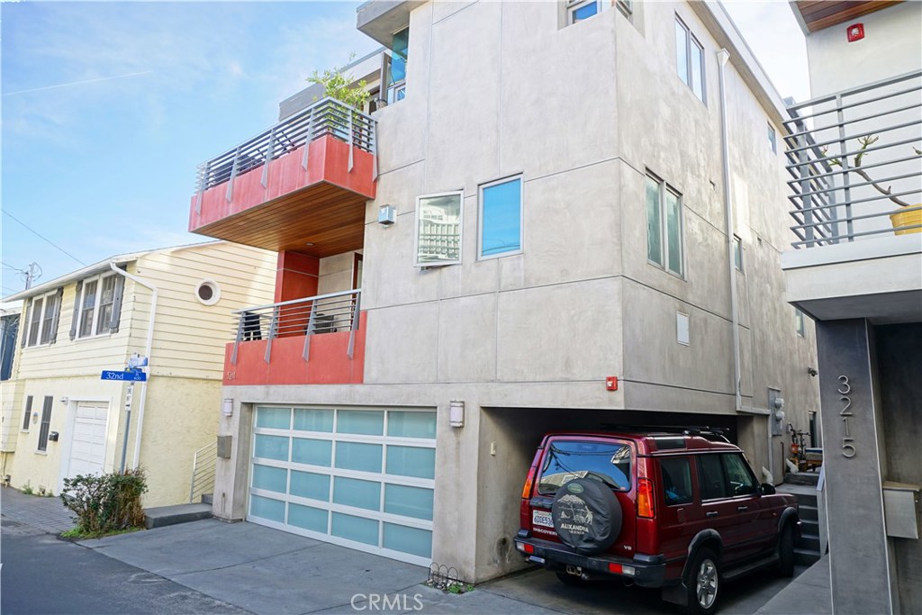 3211 Vista Drive Manhattan Beach, CA 90266 - Photo 2 of 35 a car parked in front of a building