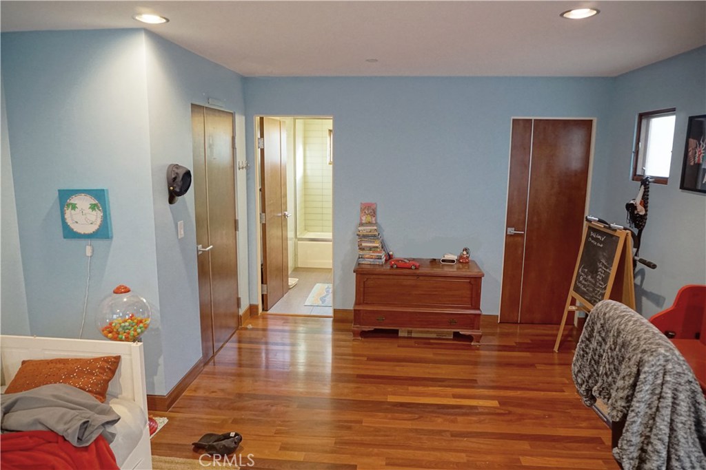 3211 Vista Drive Manhattan Beach, CA 90266 - Photo 26 of 35 a living room with furniture and a wooden floor