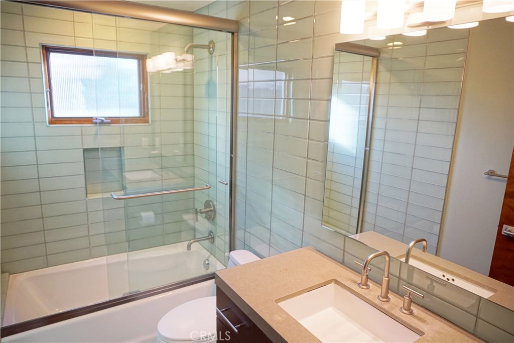 3211 Vista Drive Manhattan Beach, CA 90266 - Photo 27 of 35 a bathroom with a sink and a mirror