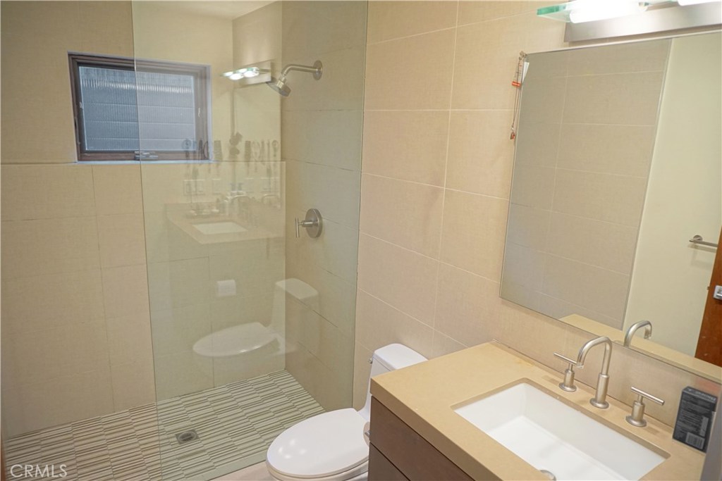 3211 Vista Drive Manhattan Beach, CA 90266 - Photo 31 of 35 a bathroom with a sink toilet and shower