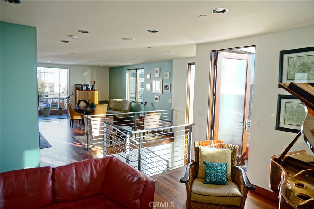 3211 Vista Drive Manhattan Beach, CA 90266 - Photo 9 of 35 a living room with fireplace furniture and a window