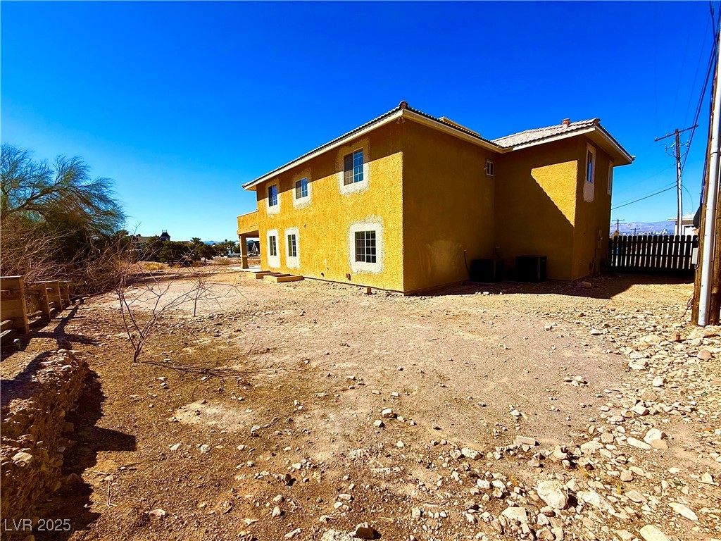 764 Benedict Drive Las Vegas, NV 89110 - Photo 30 of 30 View of property exterior with stucco siding and f