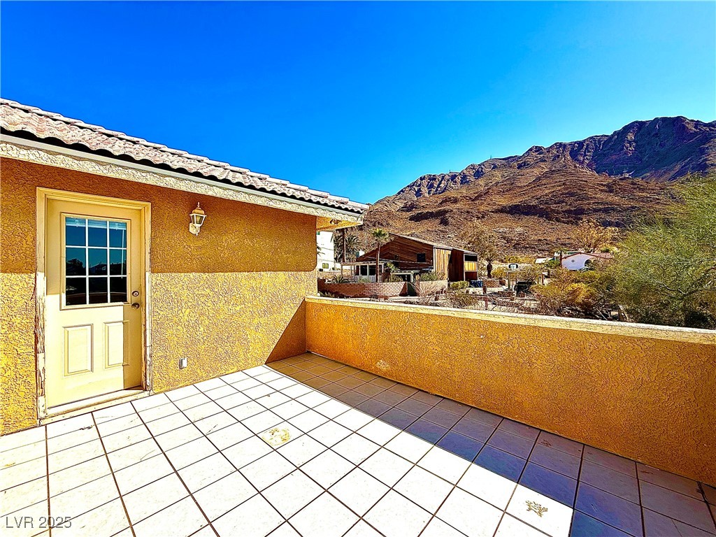 764 Benedict Drive Las Vegas, NV 89110 - Photo 4 of 30 View of patio / terrace featuring a mountain view
