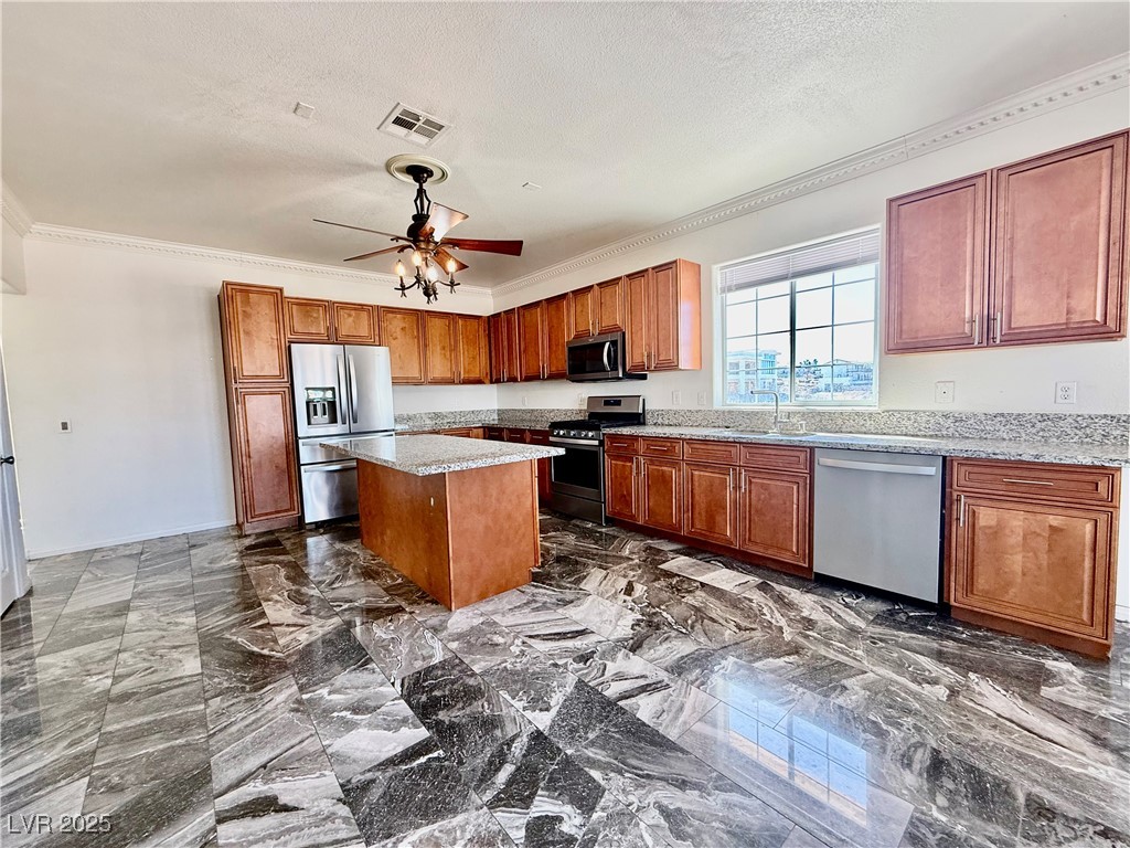 764 Benedict Drive Las Vegas, NV 89110 - Photo 9 of 30 Kitchen featuring stainless steel appliances, a te