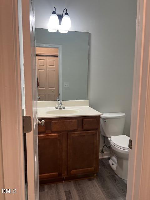 415 Aversboro Road Garner, NC 27529 - Photo 14 of 32 a bathroom with a sink and a toilet