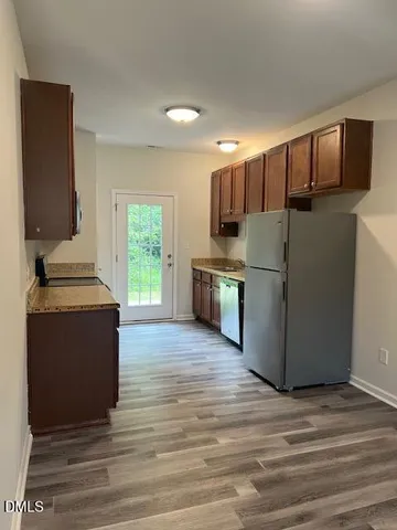 a view of a bathroom with a toilet