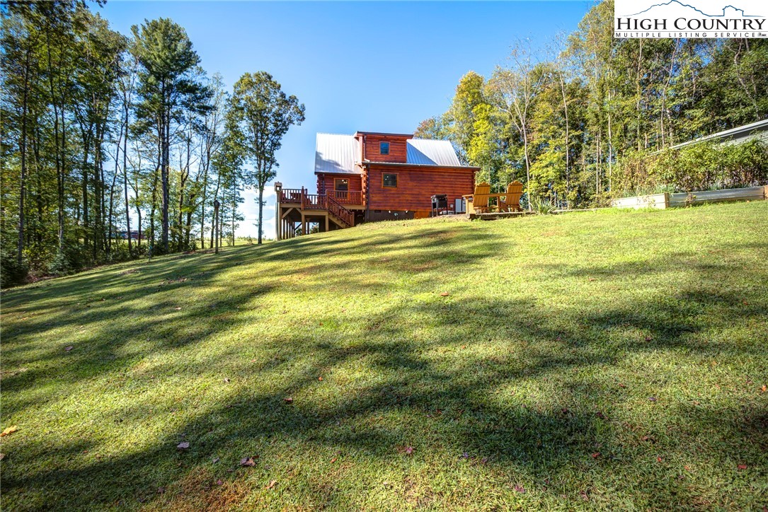 3460 South Center Church Road Thurmond, NC 28683 - Photo 49 of 50 a swimming pool in front of the house