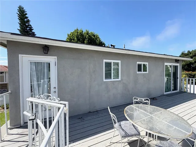 a kitchen with stainless steel appliances granite countertop a refrigerator stove a sink and a microwave