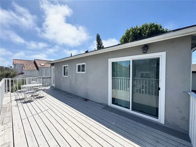 a kitchen with stainless steel appliances a refrigerator sink and microwave