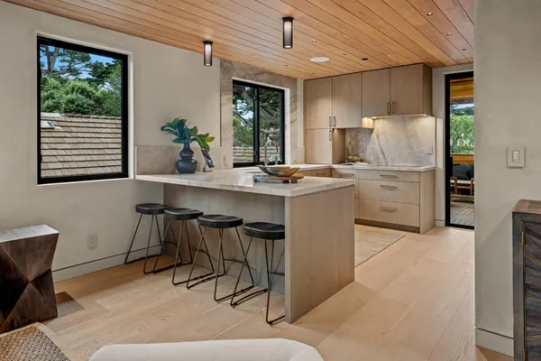 a kitchen with a sink and cabinets