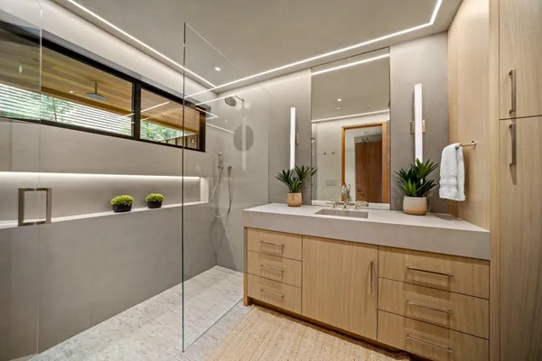 a view of a hallway with washer and dryer