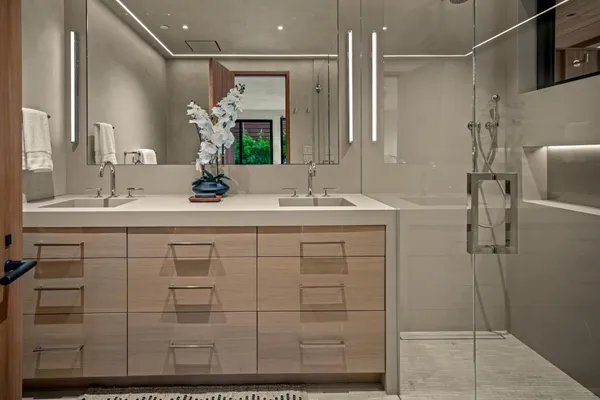 front view of a brick house with a small window