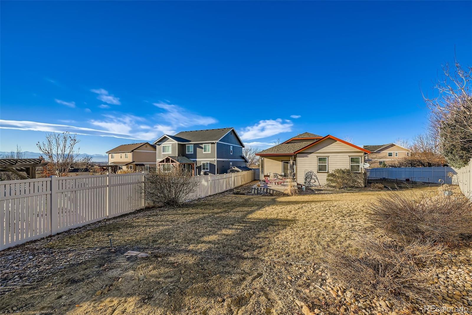 4712 Sandy Ridge Avenue Firestone, CO 80504 - Photo 25 of 29 a view of a house with a yard