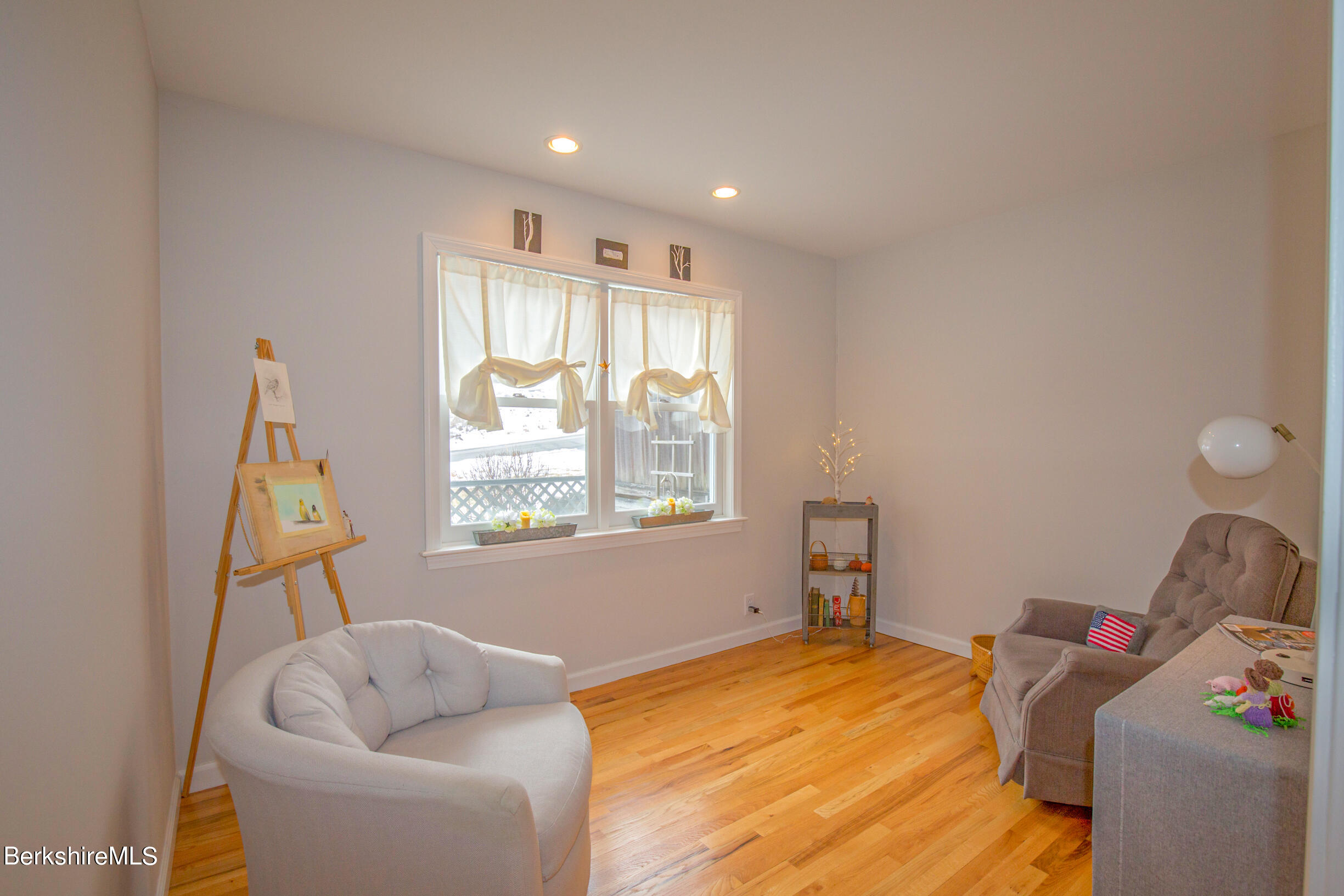1136 Barker Road, Unit 9 Pittsfield, MA 01201 - Photo 13 of 60 a bedroom with furniture and a window